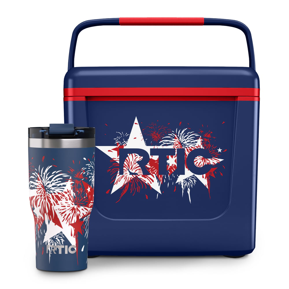 Navy RTIC 8 QT Road Trip Personal Cooler with stars and fireworks design on it, next to a navy Essential Tumbler with the same design on it.