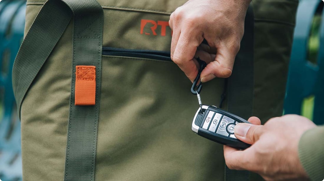 RTIC Insulated Slim Tote with keys clipped to the exterior pocket