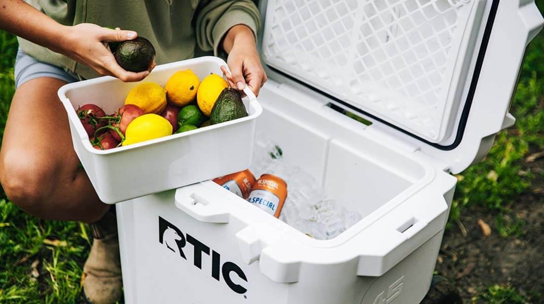 RTIC 45QT Ultra-Tough Wheeled cooler with ice, drinks and food including Dry Goods Basket