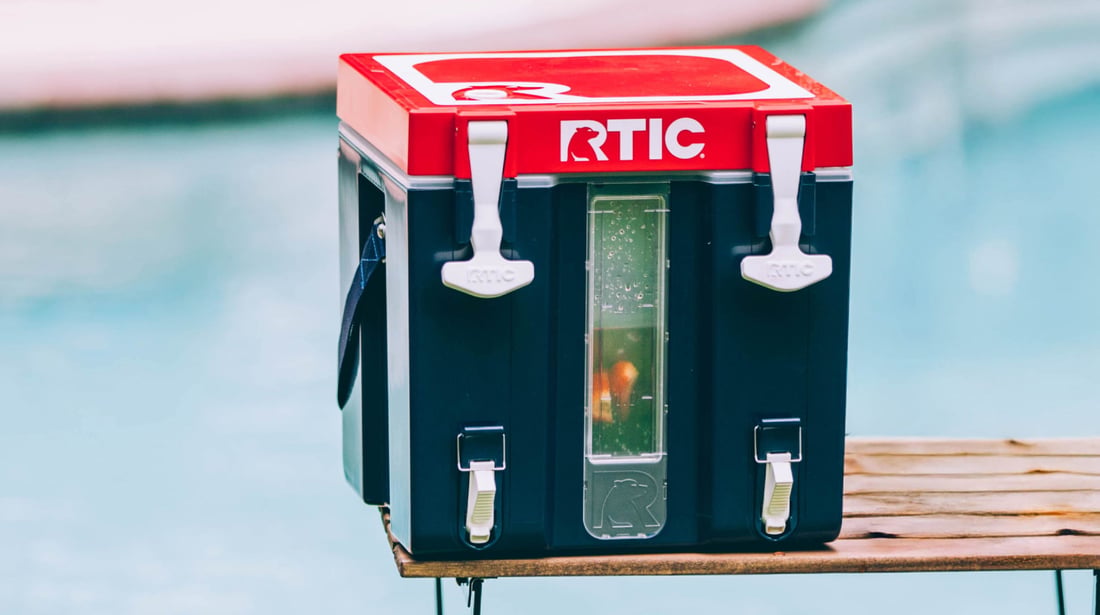 Drinks by the pool in a Patriot, red, white, and blue-colored RTIC Halftime Cooler.