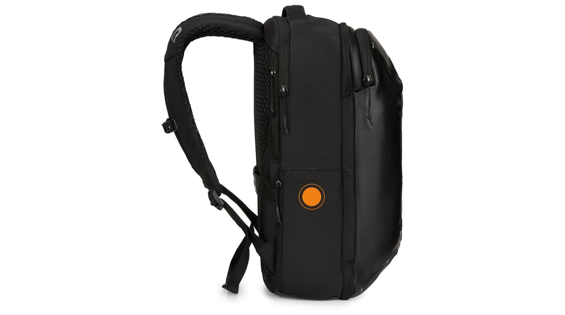 Close-up on the hideaway bottle pocket on the RTIC Road Trip Travel Pack.