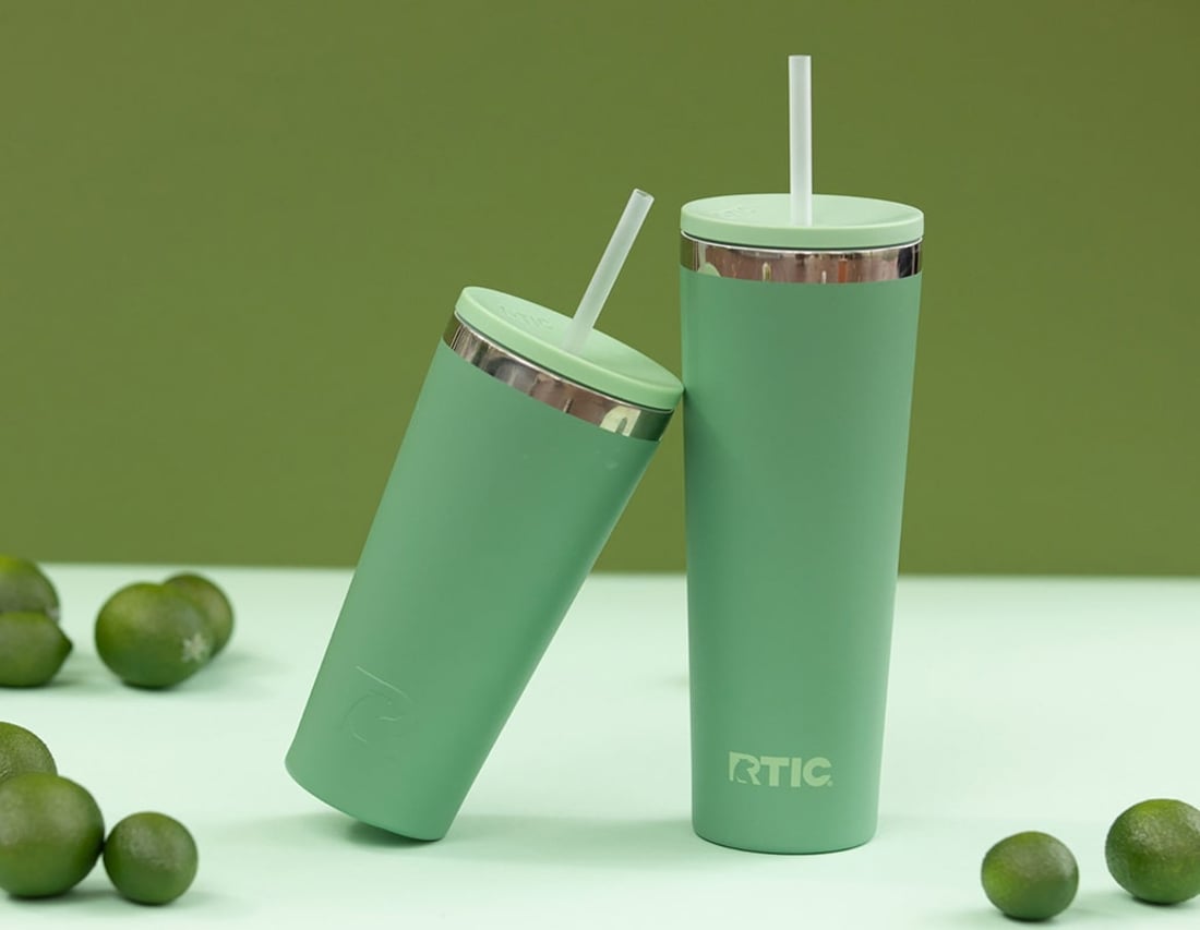 Two green RTIC everyday tumblers next to each other