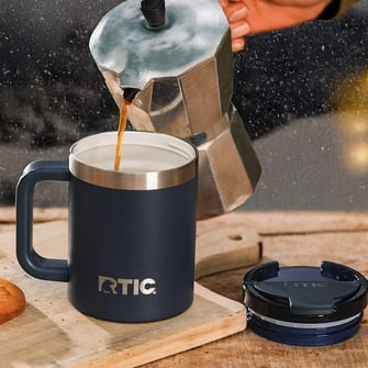 Coffee being poured into an Essential Coffee Mug.