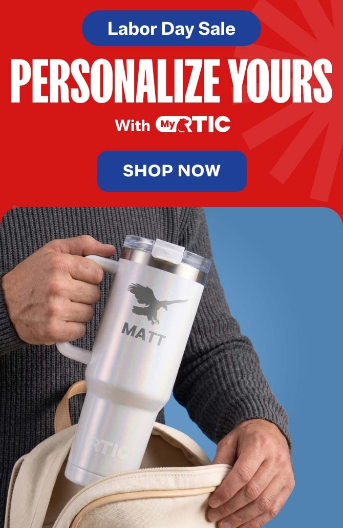 Person placing a white personalized RTIC tumbler with a handle into their backpack.