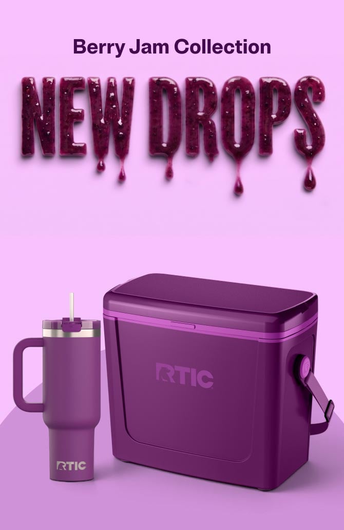A small purple RTIC hard cooler and purple tumbler with a handle and straw on a lavender background.