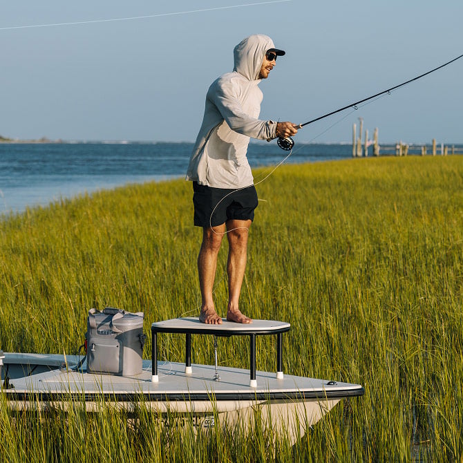 Fisherman casting off a boat.