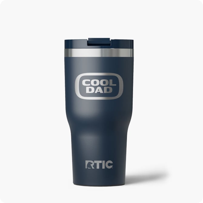 Personalized navy RTIC tumbler on a white background