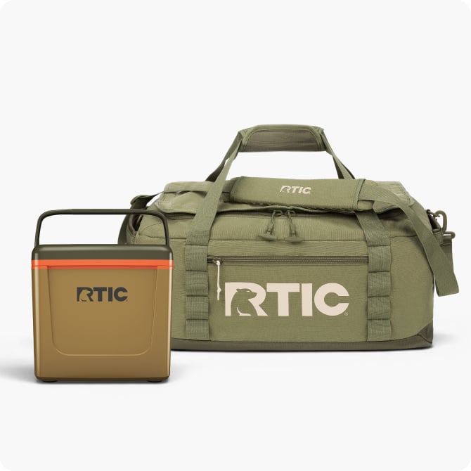 tan RTIC cooler and olive green duffle next to each other with a white background