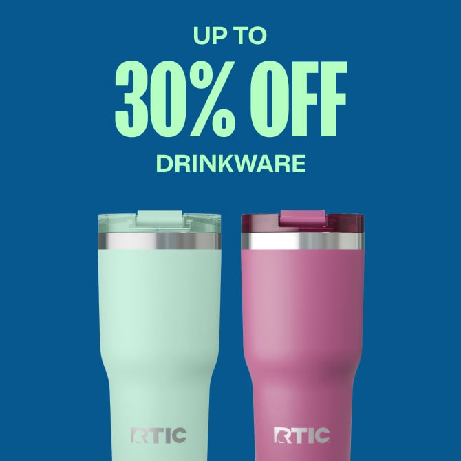 One teal and one orchid RTIC Essential Tumbler on a blue background.