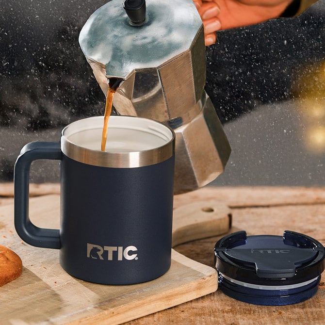 Coffee being poured into an Essential Coffee Mug.