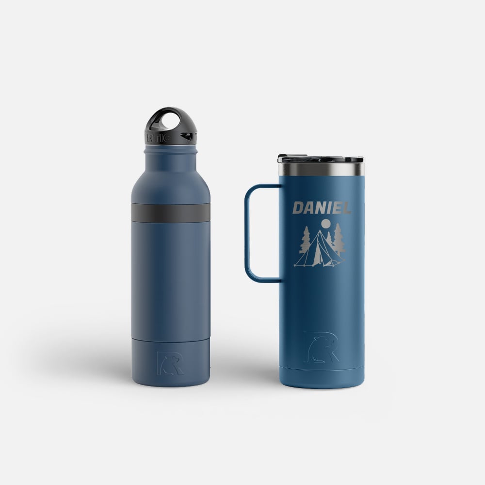 Navy bottle chiller next to a navy travel mug personalized with the name Daniel.