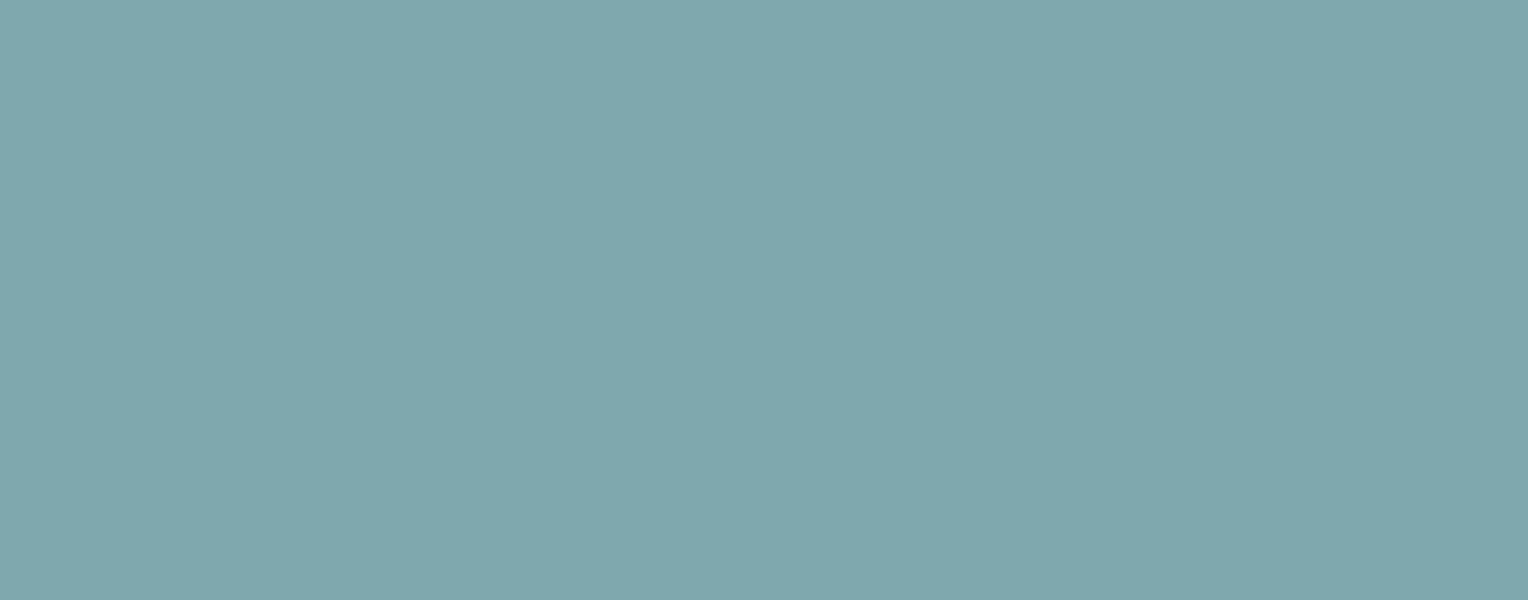 A gray RTIC Everyday Cooler on a light blue background.